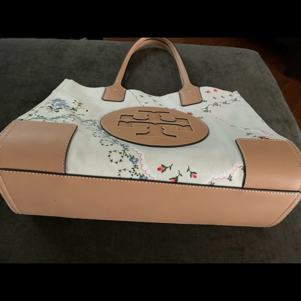 Tory Burch canvas bag, floral on front and back, with dust cover.